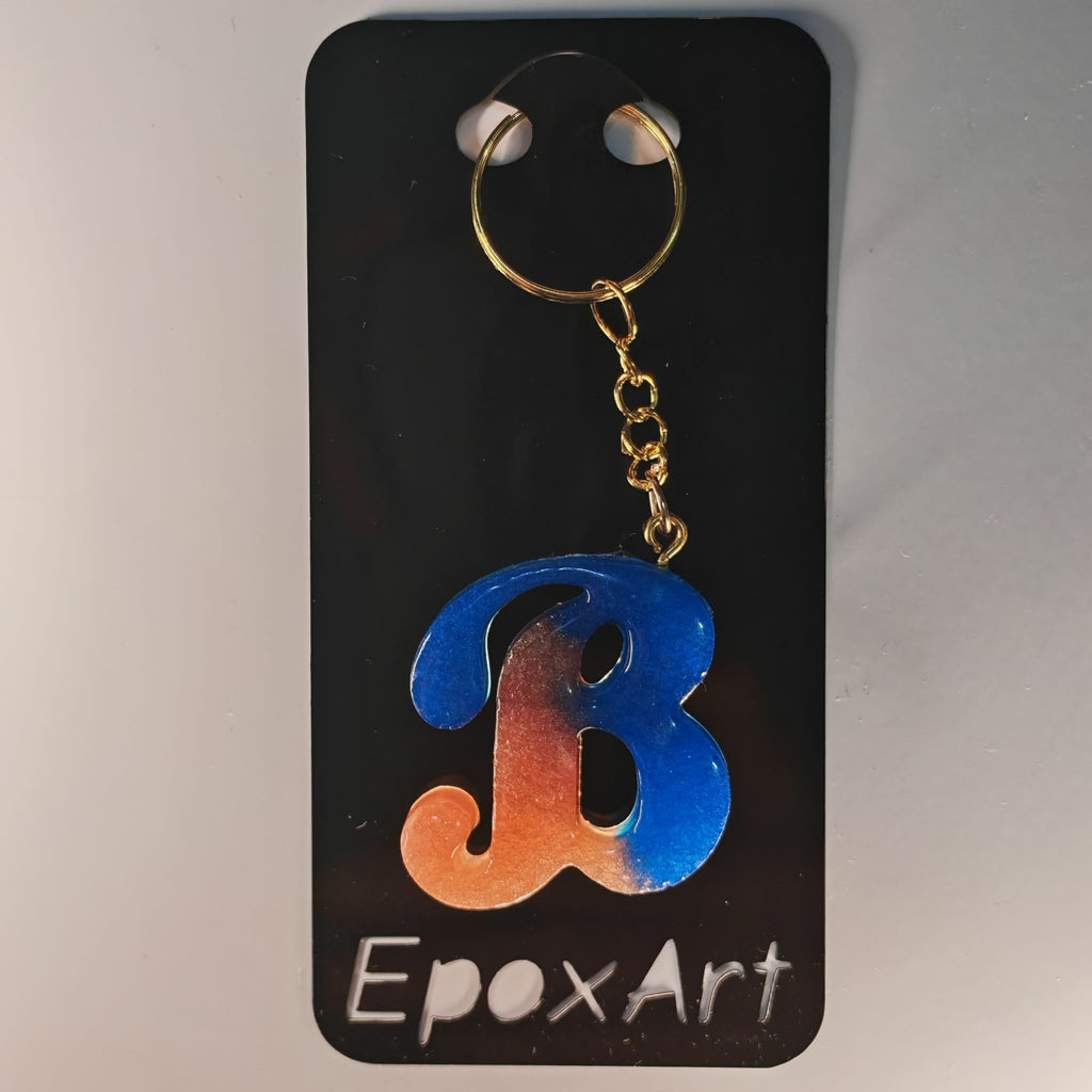 Porta-chaves Letra B em Resina – Azul & Rosa com Brilho Perolado - 5,00 € - PORTES GRÁTIS