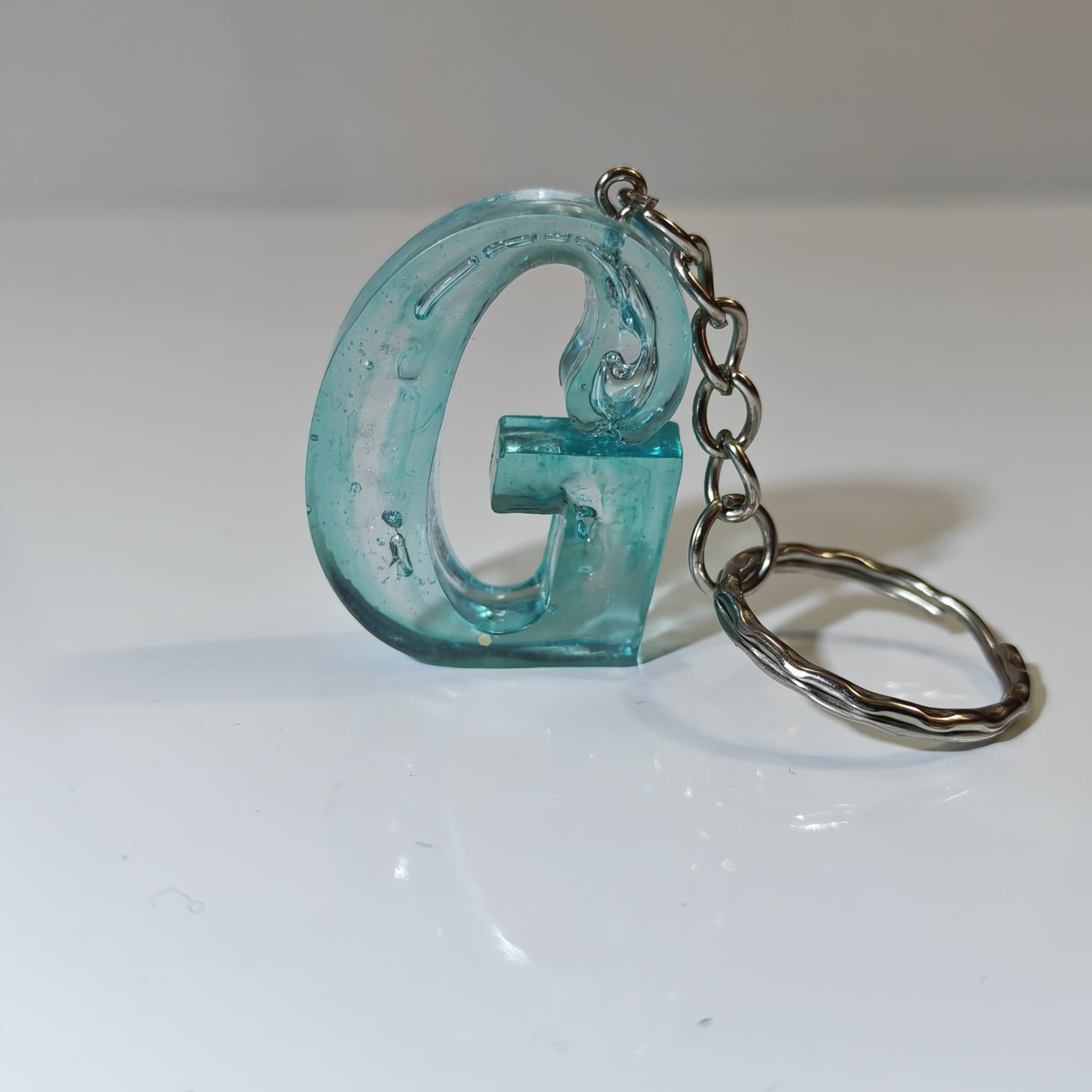 💎 Porta chaves Letra G em Resina Azul Translúcida - 5,00 € - PORTES GRÁTIS